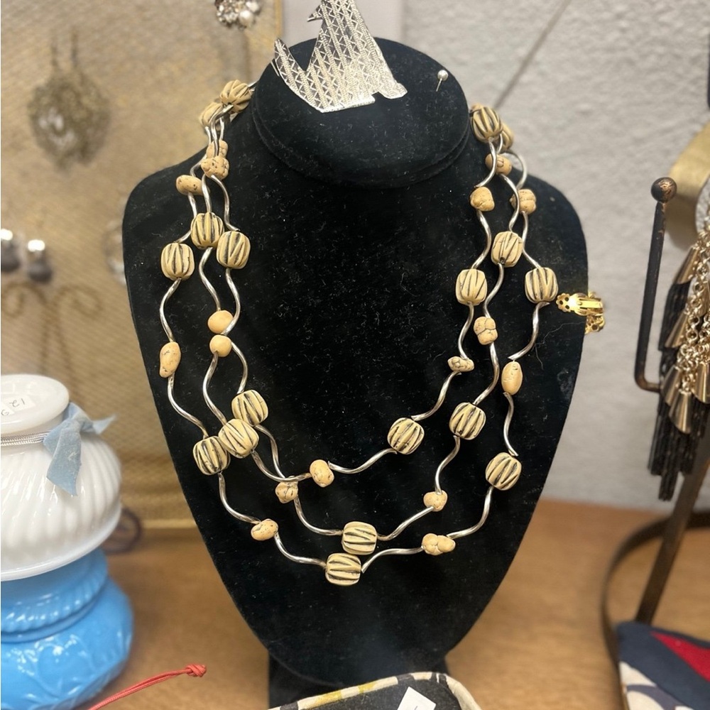 Gold and Silver Multi-Strand Necklace with Textured Discs